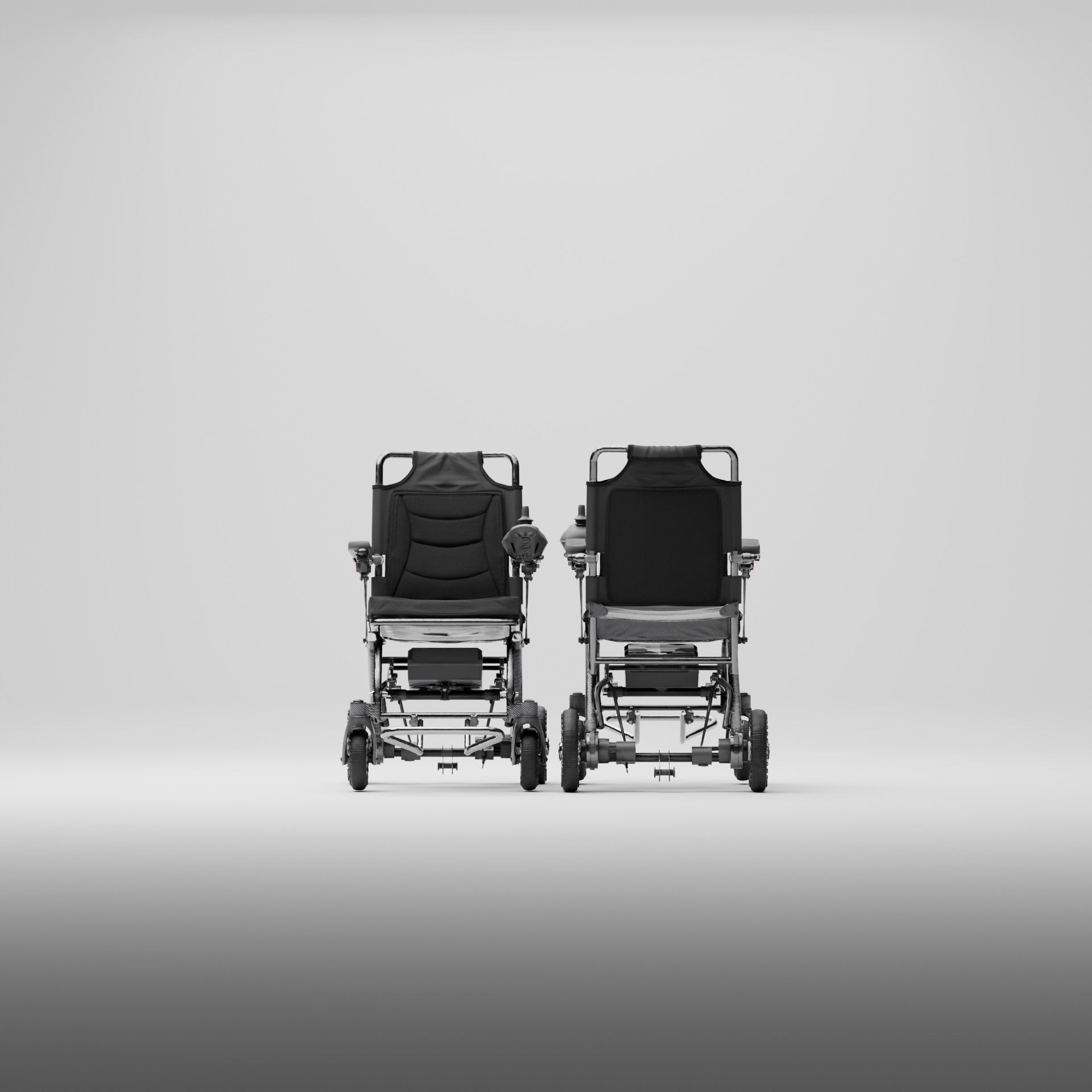 Two black wheelchairs shown from front and back on a gray background
